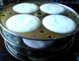 South Indian Idli recipe batter idli stand 325x250