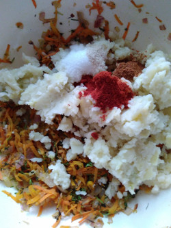 adding spices to veg mix for aloo tikki 250x333