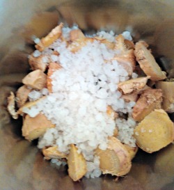 Homemade ginger paste adding salt to chopped ginger 250x273