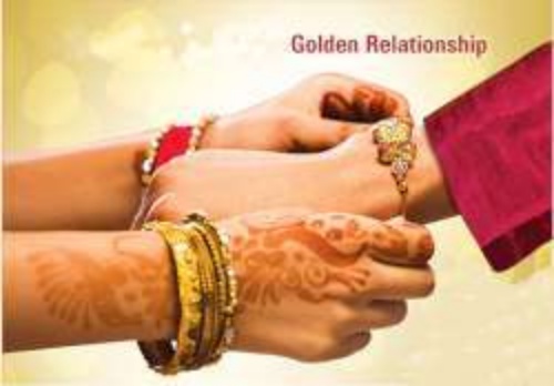 sister tying rakhi rakshabandhan 500x348